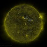A full sun image observed by SDO. The greenish color is 171 Angstrom extreme ultraviolet light. The yellow and blue colors are the positive and negative polarity magnetic field respectively.