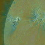 A composite image using an HMI magnetogram, AIA 171 (negative image) and AIA 131 from May 16, 2013