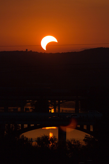 Photo of partial solar eclipse as seen near sunset on May 20, 2012, from Austin, Texas. Image credit: mrlaugh’s photostream
