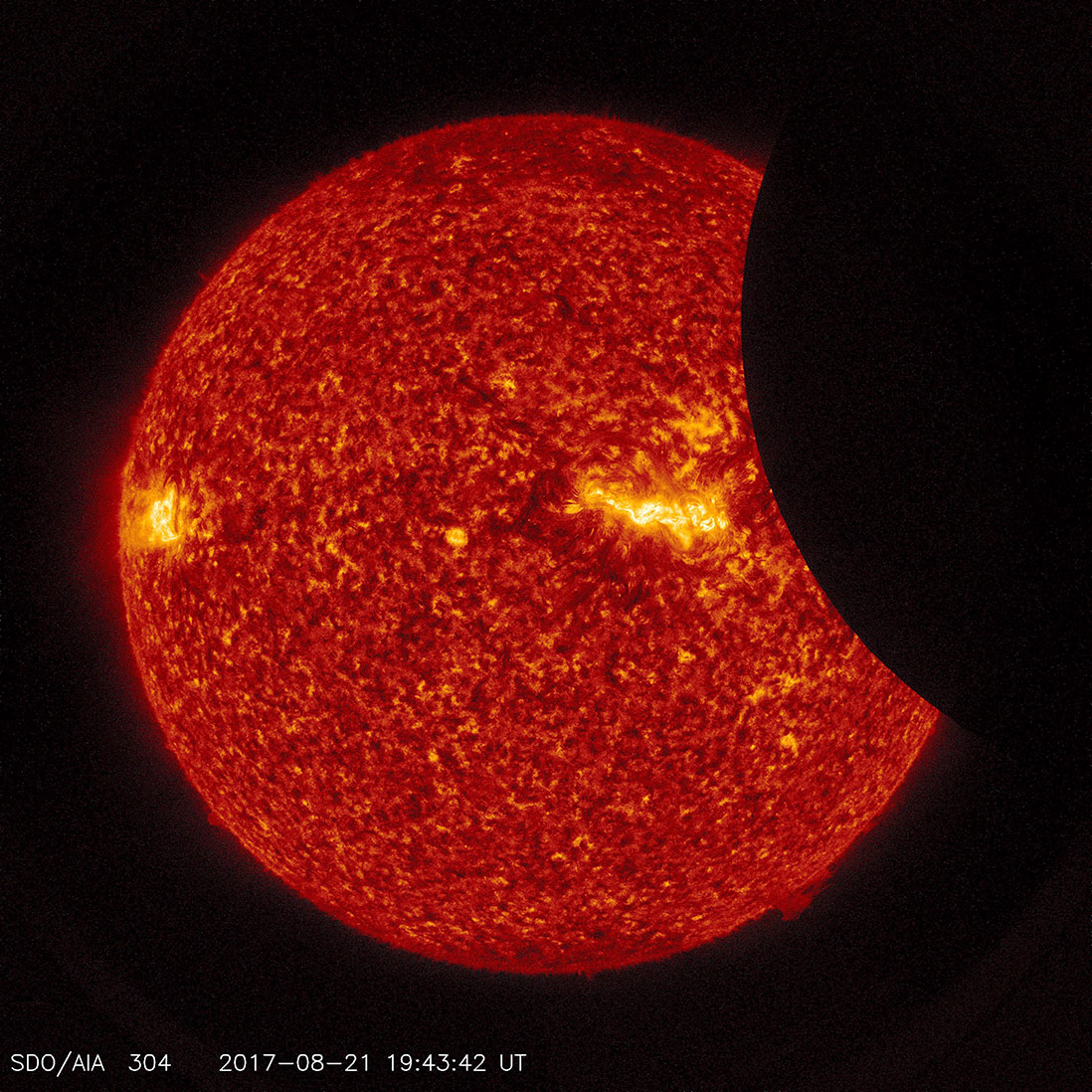 Image of the Moon transiting across the Sun, using a blend of 171 ångstrom extreme ultraviolet light and visible light imagery from SDO from August 21, 2017. Credit: NASA/SDO