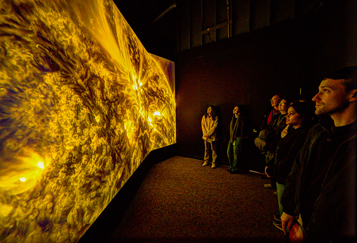 A crowd looks at Solarium in February 2015 at the Goddard Visitor Center in Greenbelt, MD. Photo Credit: NASA's Goddard Space Flight Center