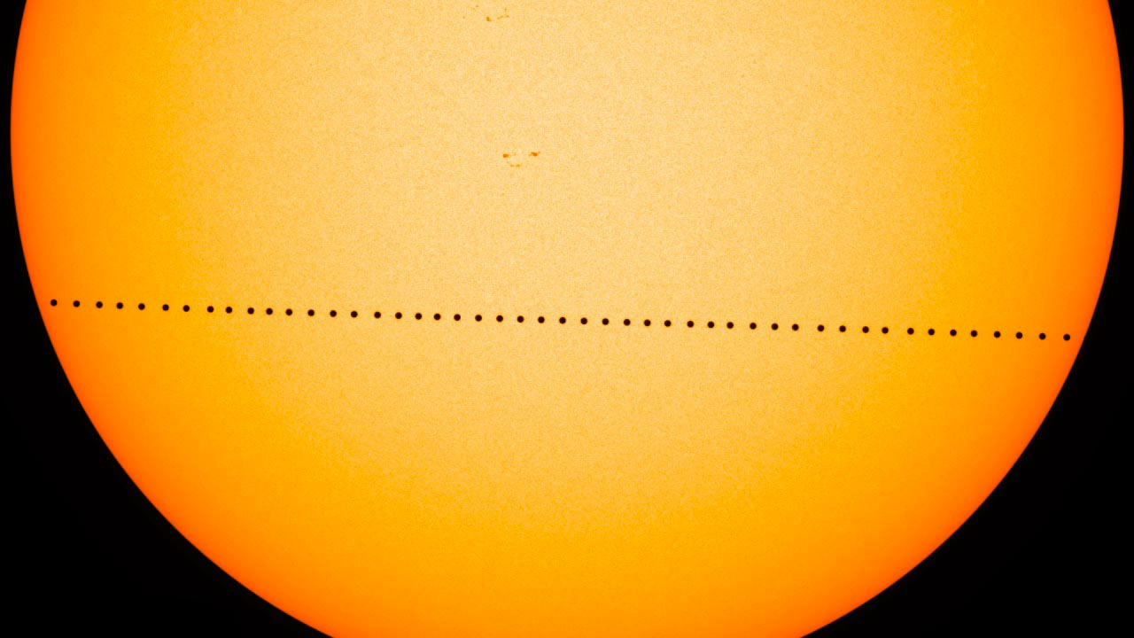 Composite image of Mercury transiting across the sun on May 9, 2016, as seen by HMI on NASA's Solar Dynamics Obersvatory. HMI is an instrument designed to study the magnetic field at the solar surface, or photosphere. Credit: NASA/SDO